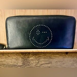 Black Leather Anya Hindmarch Emoji long wallet.